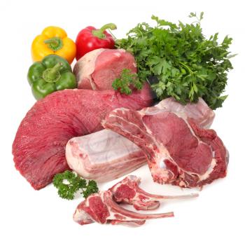 assortment of raw meat with vegetables
