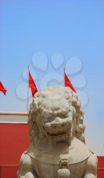 Stone lion near the entrance to Forbidden City