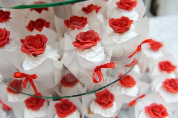 Beautiful and tasty wedding cupcake white and red color