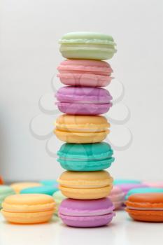 Pyramid of artificial colored macaroons, plastic decor