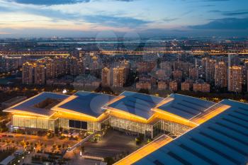 Illuminated residence buildings at night. Photo in Suzhou, China.