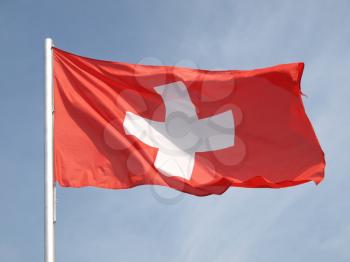 Flag of Switzerland over a blue sky
