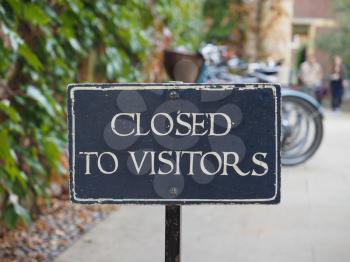 closed to visitors sign, selective focus blurred background bokeh