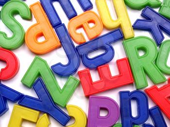 English alphabet letters in plastic toy characters