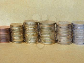 Pile of Euro coins currency of the European Union - selective focus on coins with blurred background copy space
