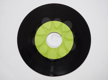 Single vinyl record vintage analog music recording medium 45 rpm green label