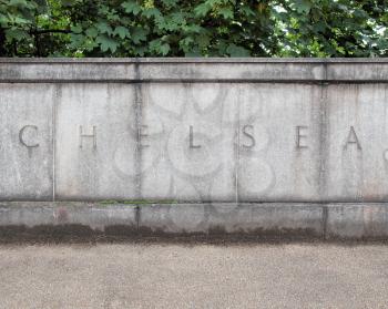 Chelsea sign written in stone on Chelsea Bridge, London, UK