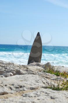 Royalty Free Photo of a Surfboard at the Beach