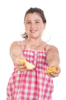 Royalty Free Photo of a Little Girl Eating Chips