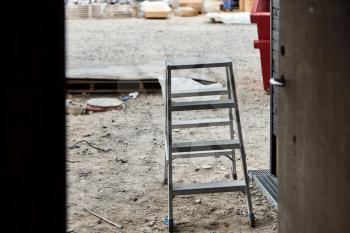 painting equipment on the floor on a construction site