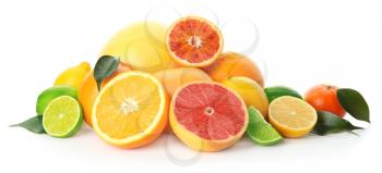 Different tasty citrus fruits on white background�