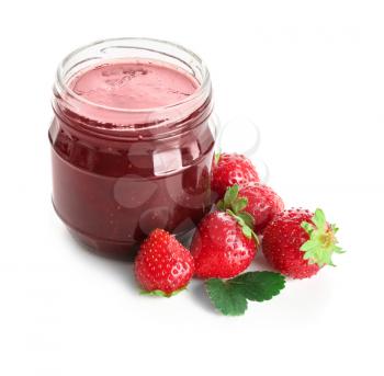 Glass jar with delicious strawberry jam on white background�