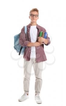 Teenage boy with backpack and books on white background�