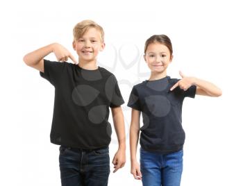 Cute children in t-shirts on white background�
