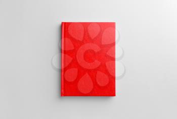 Book with blank cover on light background�