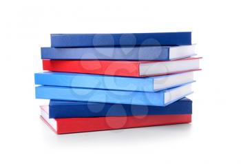 Stack of books on white background�