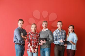 Group of young business people on color background�