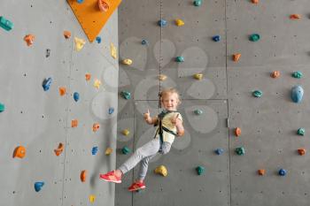 Cute little girl in climbing gym�