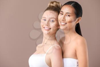 Young women with contouring makeup on color background�