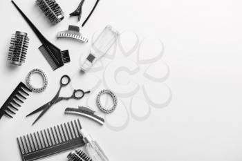 Set of hairdresser tools and accessories on white background�