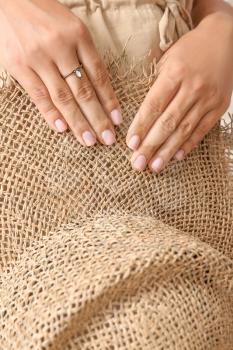 Woman with beautiful manicure and hat, closeup�