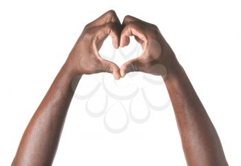 Hand of African-American man showing heart shape on white background�