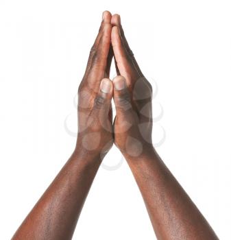 Hands of African-American man on white background�