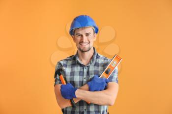 Portrait of male architect on color background�