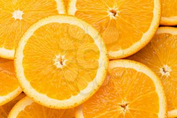 Many fresh orange slices, closeup�