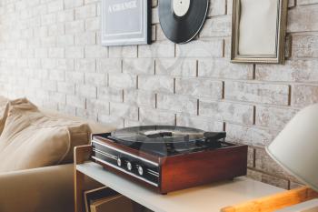 Record player on table in room�