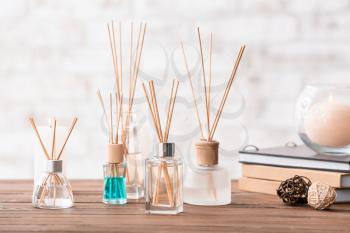 Reed diffusers on table in room�