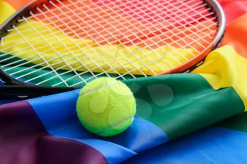 Rainbow LGBT flag and tennis racket with ball�