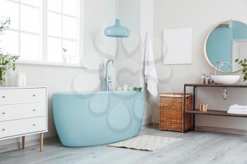Modern bathtub in stylish interior�