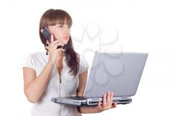 Royalty Free Photo of a Woman Talking on a Phone and Holding a Computer
