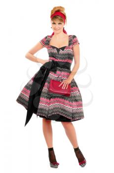 Smiling young woman in a dress. Isolated