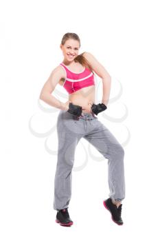 Cheerful blond woman wearing sport clothes. Isolated on white