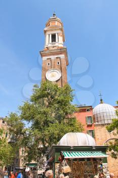 VENICE, ITALY - MAY 06, 2014:Tourists near Church Saint Apostoli   in Venice, Italy