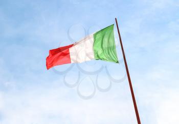 Flag of Italy against the blue sky
