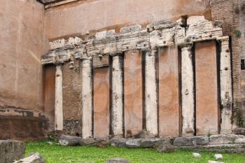 Colonnade of an ancient temple, as part of a building in Rome, Italy