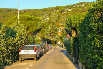 Narrow street of small picturesque town Marciana Marina on Elba Island, Italy