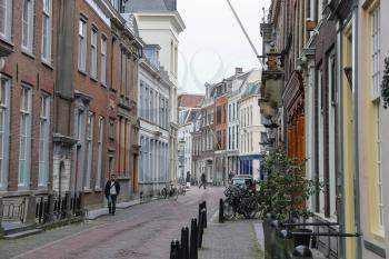 Utrecht, the Netherlands - February 13, 2016: People walking along the street in historic centre of Utrecht, the Netherlands