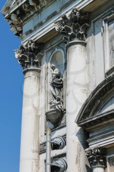 Old statue on facade of the Church of Santa Maria del Rosario (Gesuati). Venice, Italy