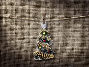 Royalty Free Photo of a Christmas Tree Ornament Hanging on a String