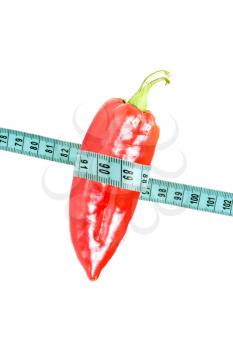 Royalty Free Photo of a Pepper Wrapped in Measuring Tape
