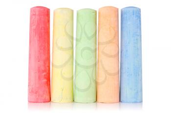 Multi colored chalk isolated on white background 
