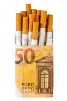 Package of cigarette wrapped in a 50 Euro banknote. Expensive bad  habit.