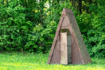  Outdoor village toilet with opened doors