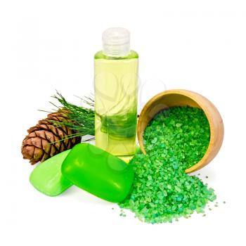Cedar cones with branch, two green soap, salt in a wooden bowl, shower gel isolated on white background