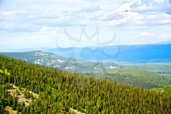 View of the ridge Kvarkush covered by forest in the Ural Mountains