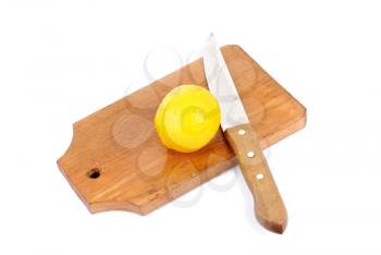 Royalty Free Photo of Lemons on a Cutting Board